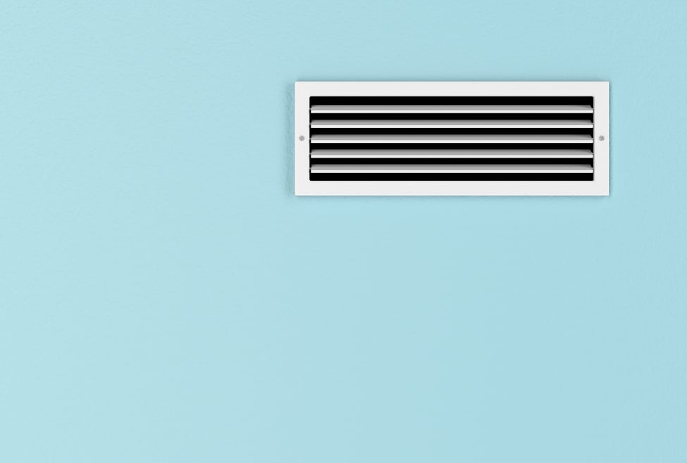 Improve AC airflow. A clean, white HVAC vent installed on a light blue wall, representing improved AC airflow and efficient ventilation. This image highlights the air conditioning and ventilation services provided by Arctic Air in Lancaster and Palmdale, CA, ensuring optimal indoor air quality and energy efficiency. HVAC vent, air conditioning vent, air duct, Lancaster CA, Palmdale CA, air conditioning repair, HVAC installation, heating services, residential HVAC, commercial HVAC, air quality, duct cleaning, energy efficiency, ventilation, AC maintenance, air conditioning installation, Arctic Air AV, HVAC services, Carrier, Goodman, Trane, Southern California HVAC, cooling system.